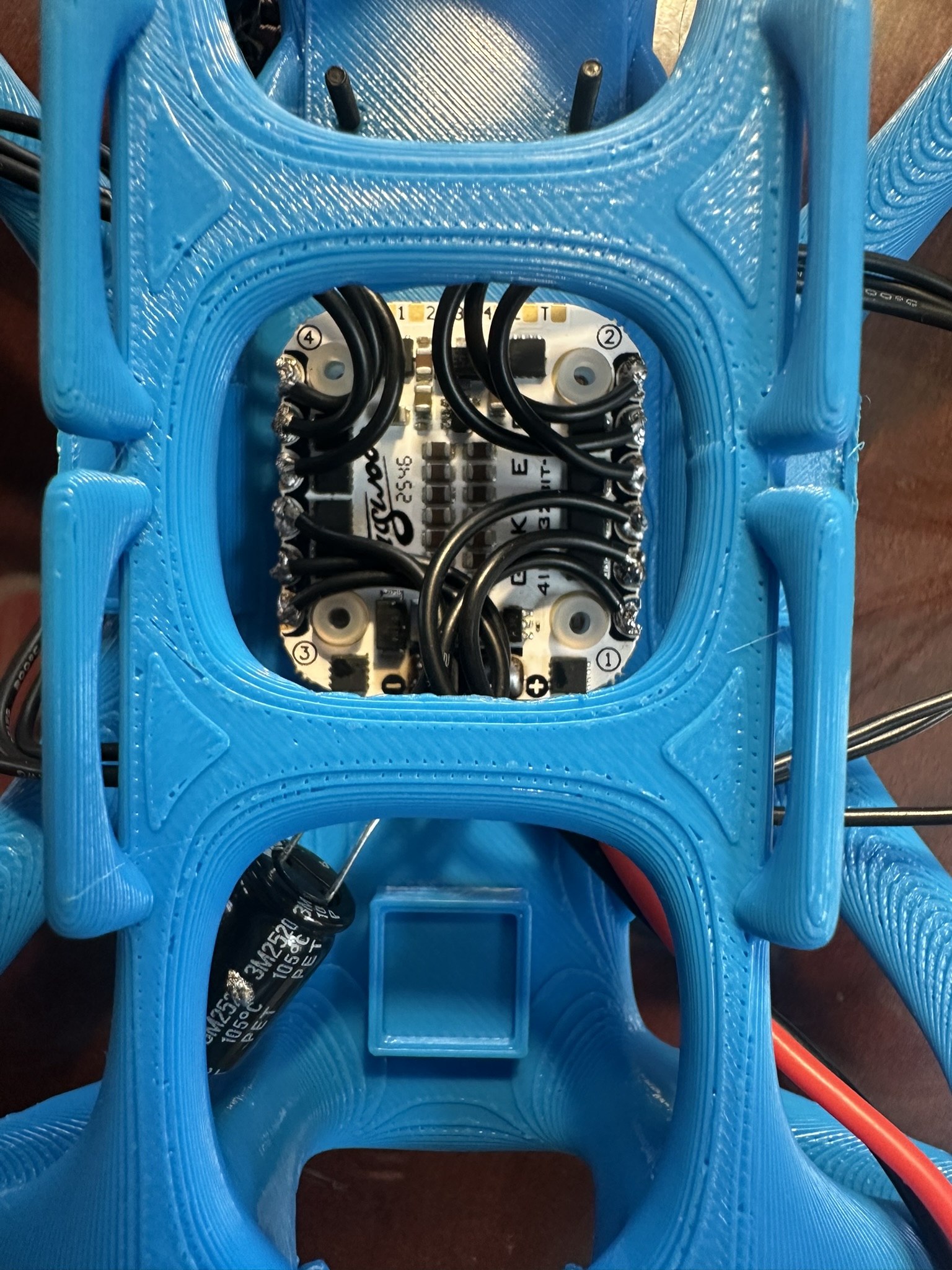 Image of a drone ESC with questionable soldering :(